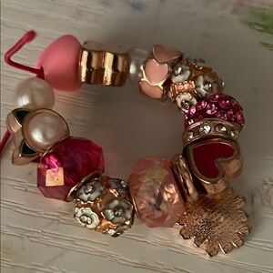Pink and Gold Charm Bracelet with Diverse Beads